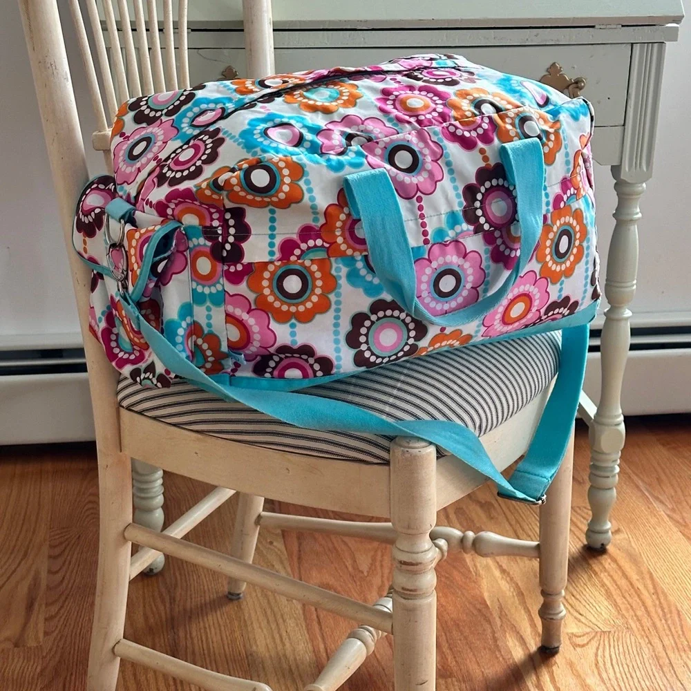 ROOM brand laminated diaper/travel duffel in Rare print